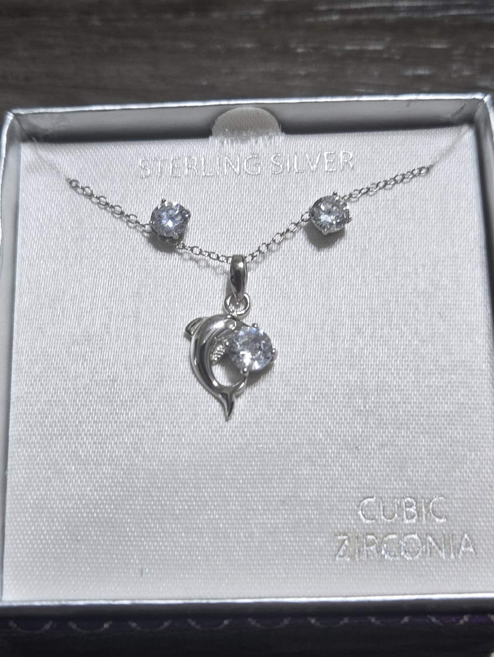 Sterling Silver Dolphin Cubic Zirconia Necklace -and Earrings
